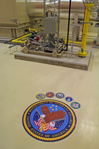 HVAC equipment with Department of Veterans Affairs seal on floor