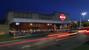 Reds Corner Grill exterior time exposed with taillights at night