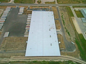 crane shot of commercial building roof