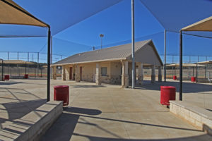 empty concession area in center of baseball field complex