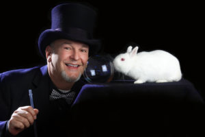 magician portrait with bubble and white rabbit