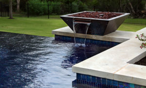 water feature in backyard pool