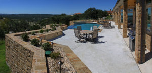 back patio with pool and hot tub on hill