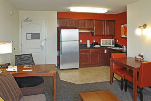 kitchenette inside hotel room