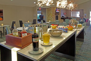 hotel lounge with drinks and buffet