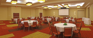 empty hotel conference room with banquet setup