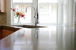 stained kitchen countertops with reflection