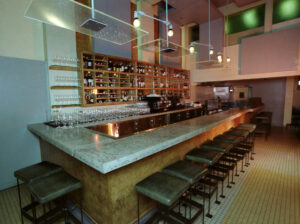 wide angle of wine bar with stained concrete bar