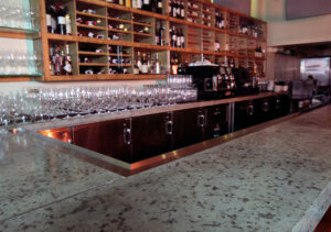 closeup of stained cement bar inside wine bar